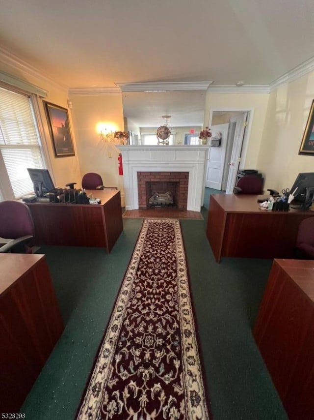 home office with crown molding and a fireplace