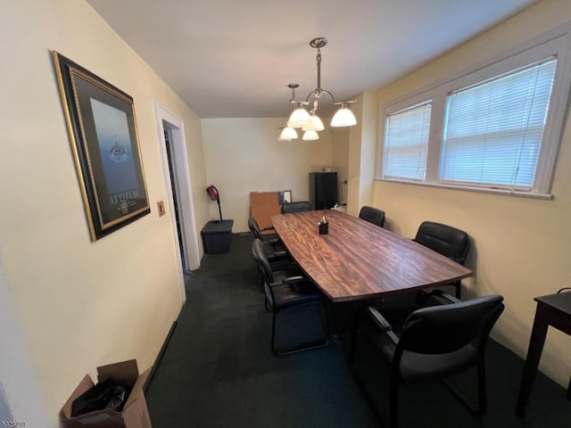 dining area featuring carpet