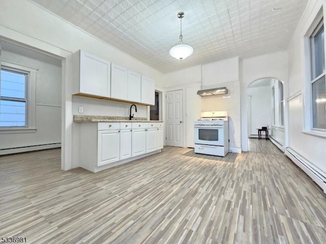 kitchen featuring white cabinetry, a baseboard radiator, sink, hanging light fixtures, and white range with gas cooktop