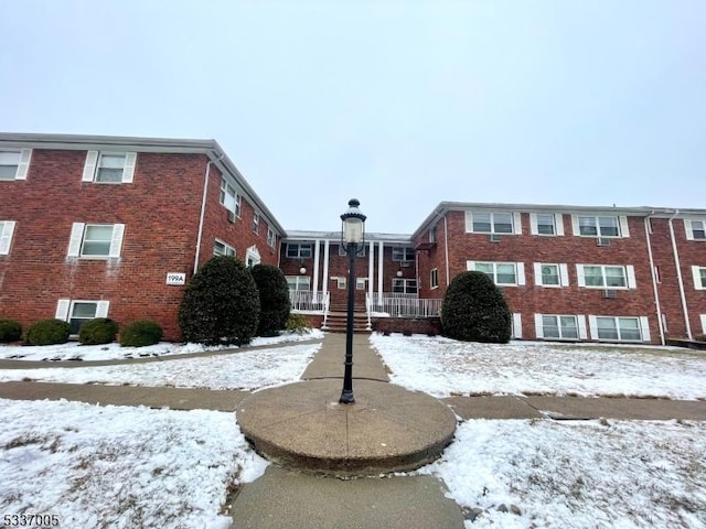 view of snow covered building