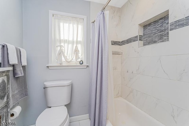 bathroom featuring toilet and shower / bath combo with shower curtain