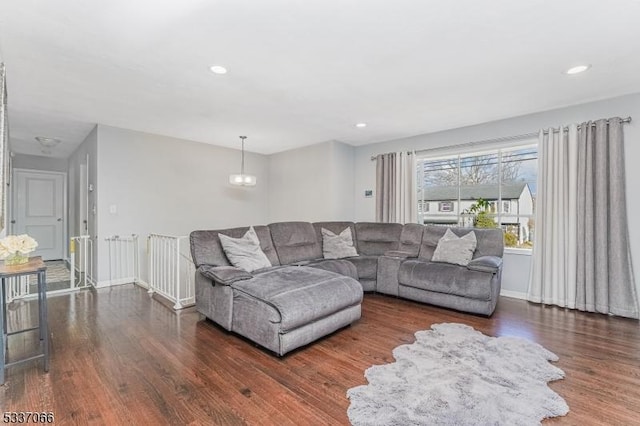 living room featuring dark hardwood / wood-style floors