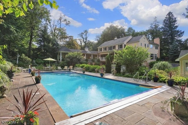 view of pool with a patio area