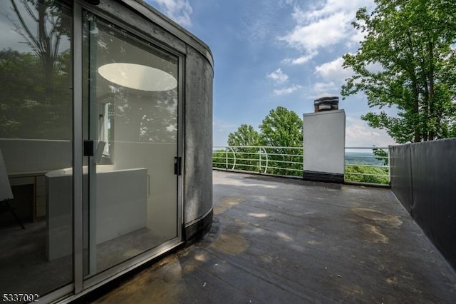 view of patio / terrace featuring a balcony