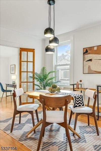 dining room featuring light wood finished floors