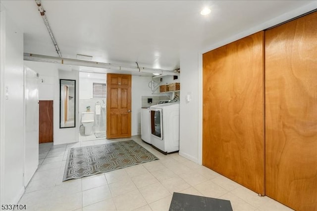 kitchen featuring washer and clothes dryer