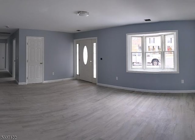 entrance foyer featuring light hardwood / wood-style floors