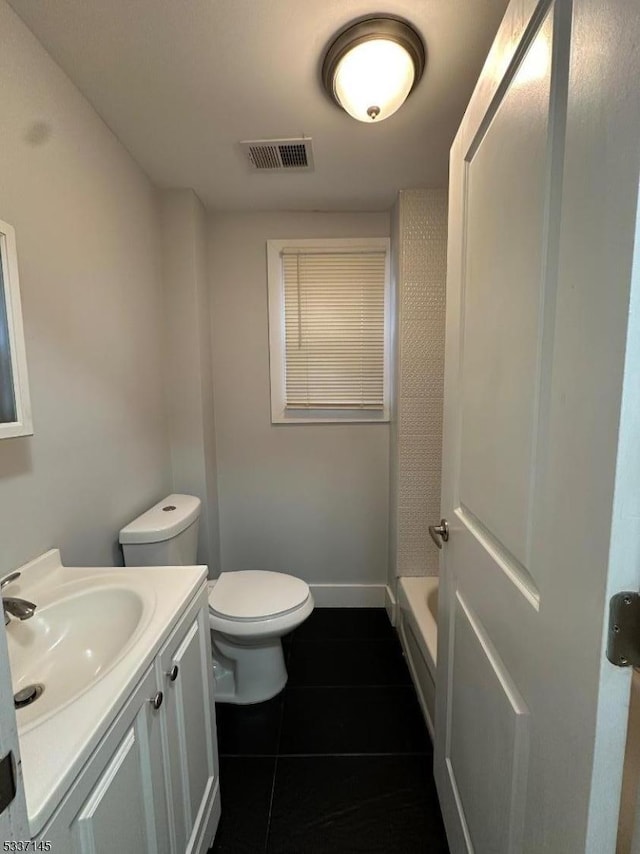 full bathroom with vanity, tile patterned floors, shower with separate bathtub, and toilet