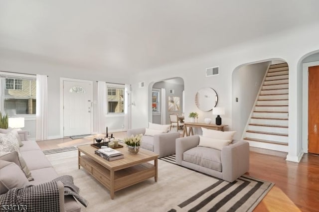 living room with light hardwood / wood-style floors