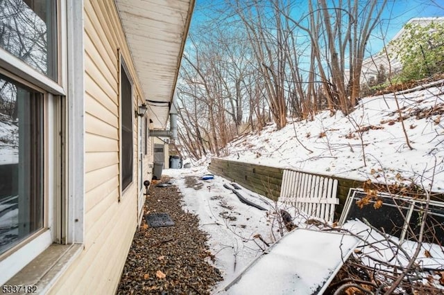 view of yard covered in snow