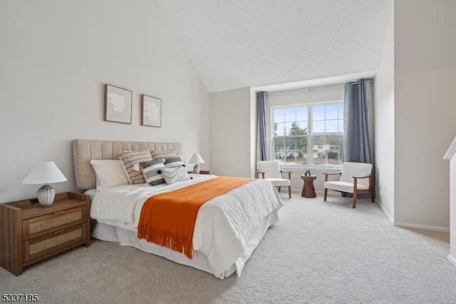 bedroom featuring baseboards, light colored carpet, and high vaulted ceiling