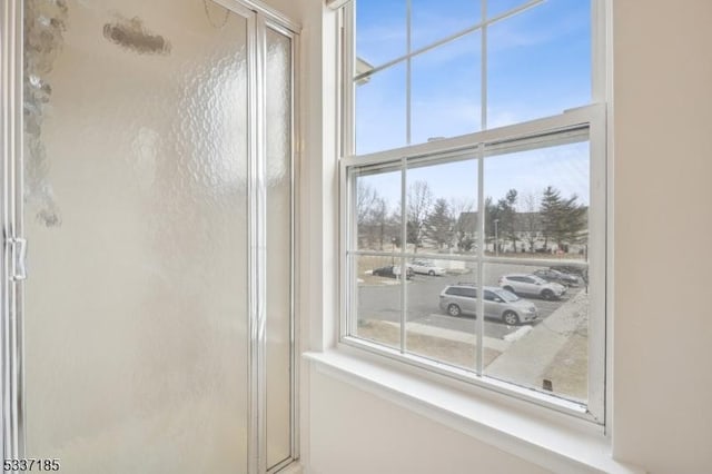 full bathroom with a shower stall