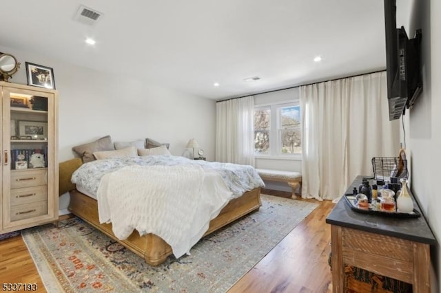 bedroom featuring hardwood / wood-style floors