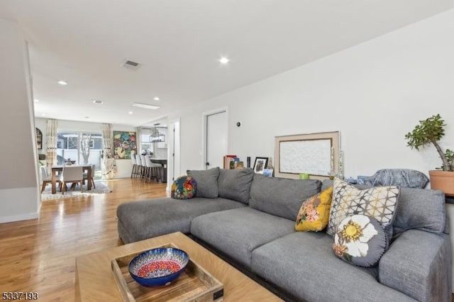 living room featuring light wood-type flooring