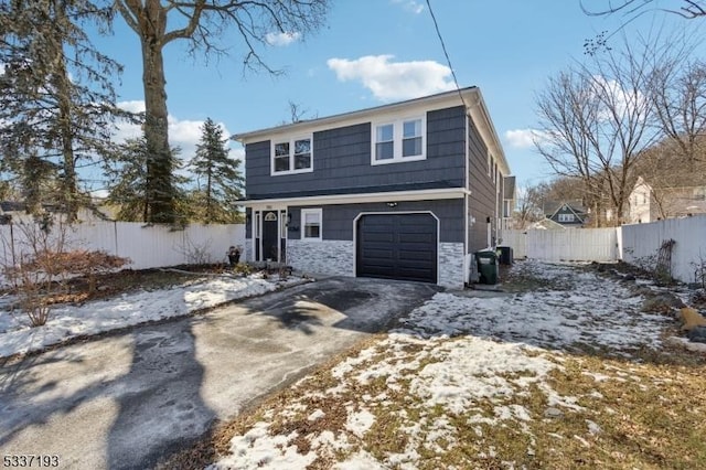 front of property featuring a garage