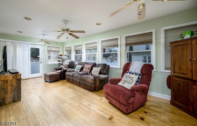 living room with light hardwood / wood-style flooring