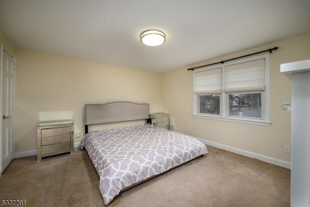 bedroom featuring carpet