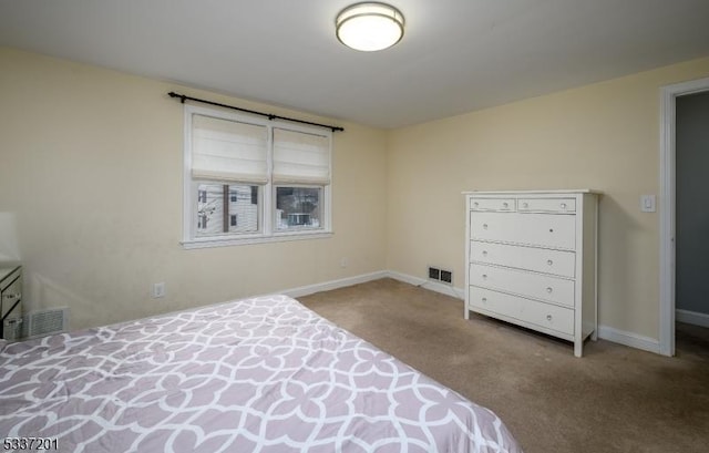 bedroom with light carpet