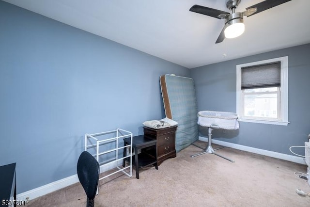 bedroom with light carpet and ceiling fan