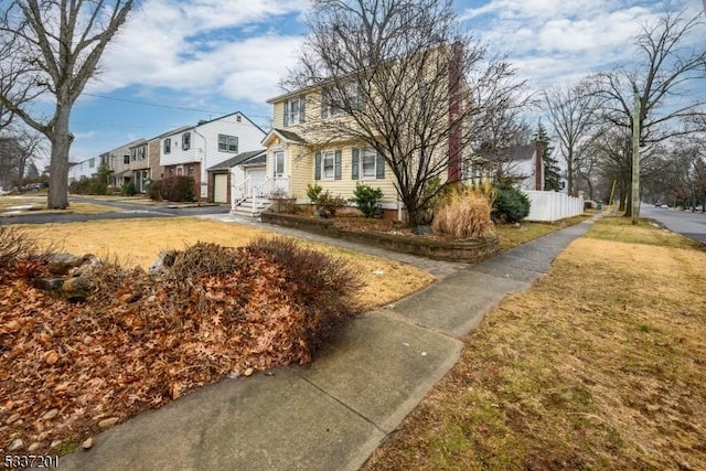 view of front facade with a front lawn