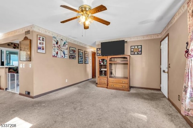 interior space with baseboards and carpet floors