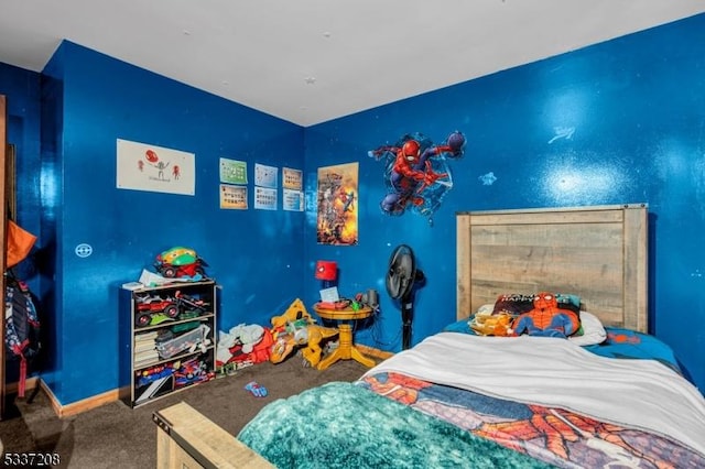 carpeted bedroom with baseboards