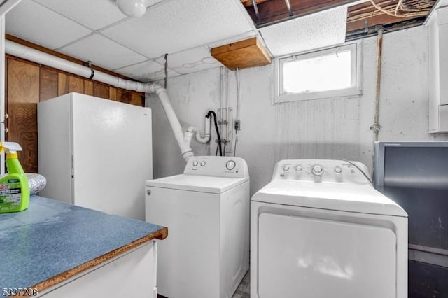 laundry room featuring laundry area and washing machine and dryer