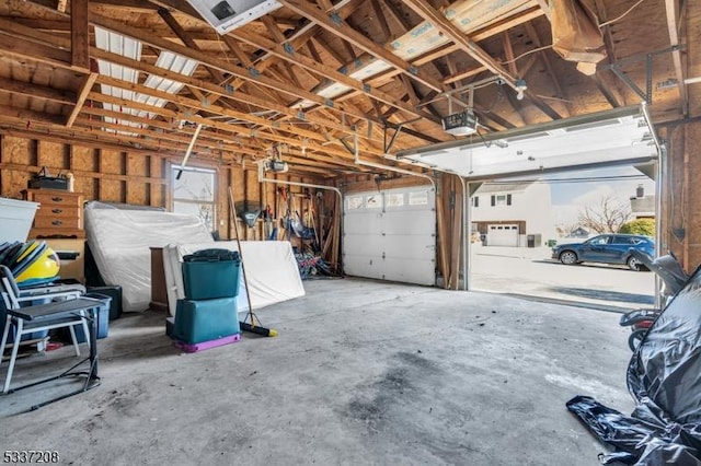 garage featuring a garage door opener