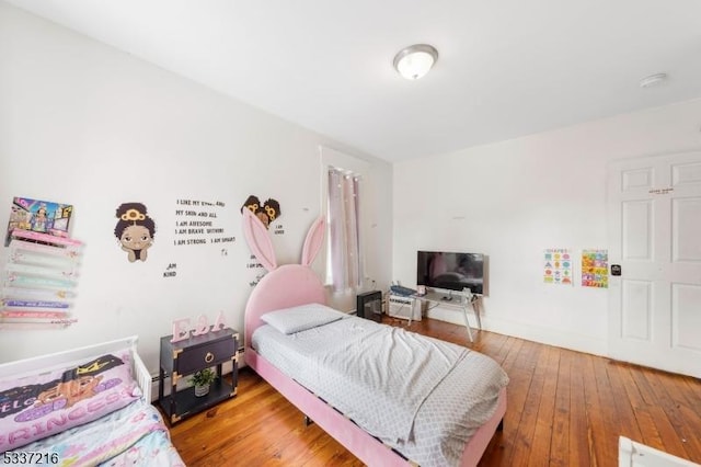 bedroom featuring hardwood / wood-style flooring