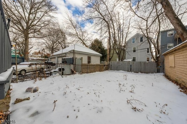 view of yard covered in snow