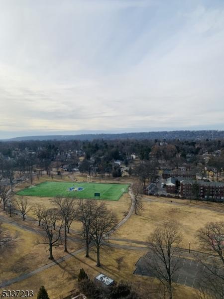 birds eye view of property featuring a rural view