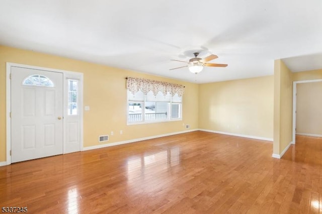 entryway featuring hardwood / wood-style flooring and ceiling fan