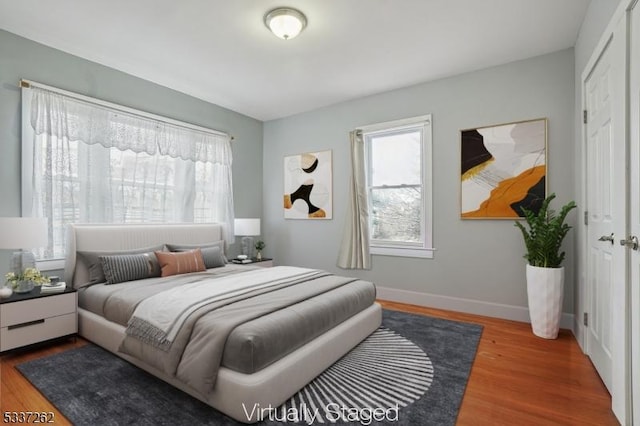 bedroom featuring hardwood / wood-style flooring