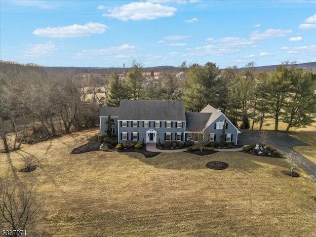 view of front of home with a front lawn