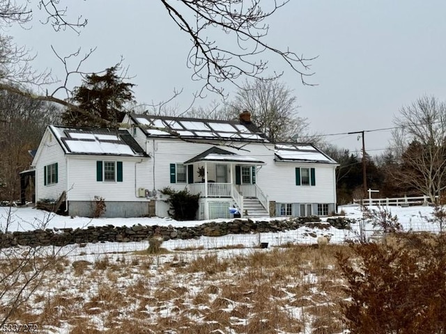 exterior space featuring a chimney