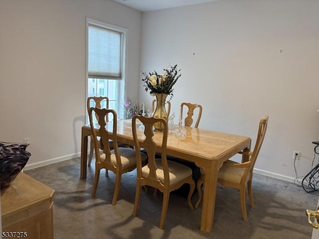 view of carpeted dining space