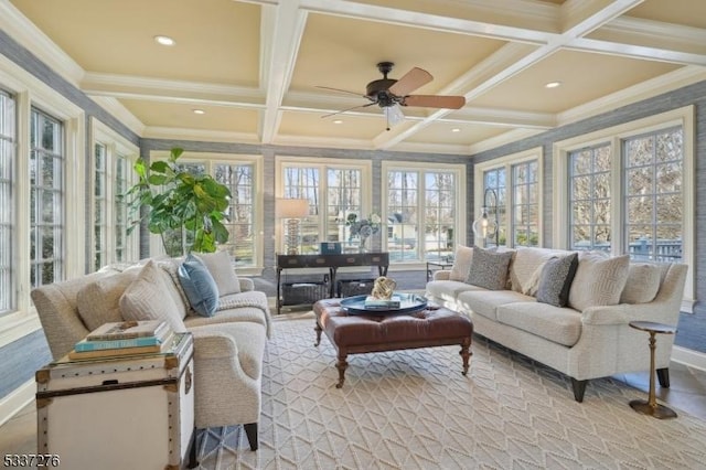 sunroom with coffered ceiling, ceiling fan, and beamed ceiling