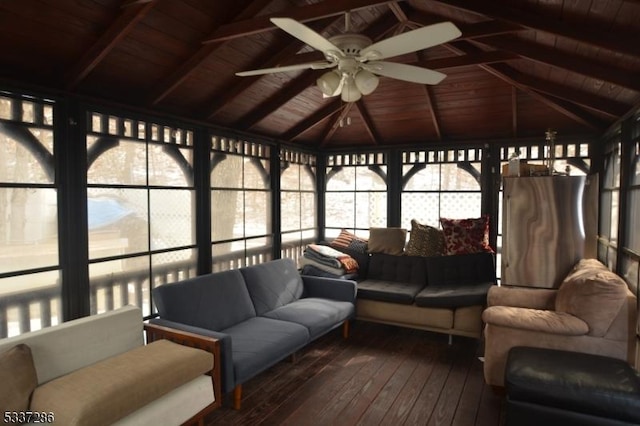 sunroom / solarium with vaulted ceiling with beams, wooden ceiling, and ceiling fan