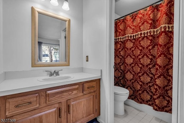 bathroom with vanity, tile patterned floors, toilet, and a shower with shower curtain