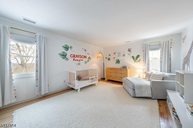 bedroom featuring light wood-type flooring