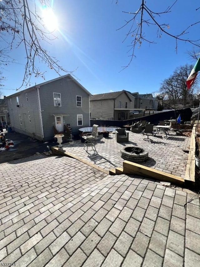 view of patio featuring a fire pit