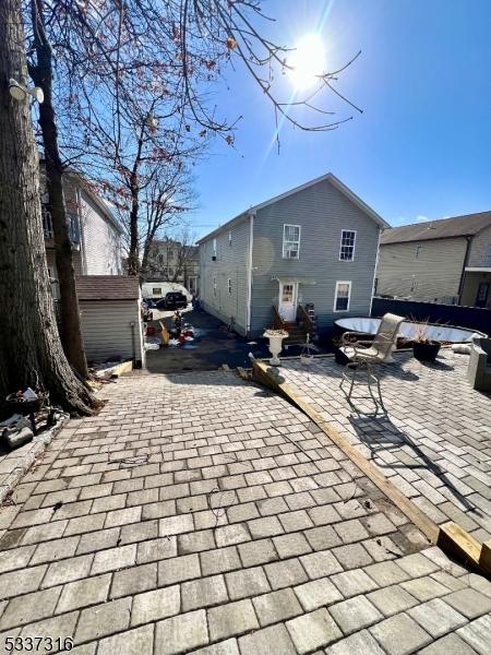 rear view of house featuring a patio area