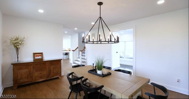 dining area with hardwood / wood-style flooring