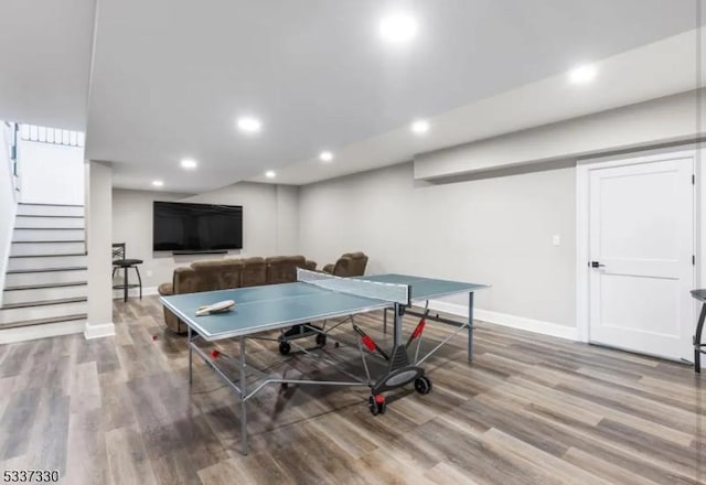 playroom with wood-type flooring