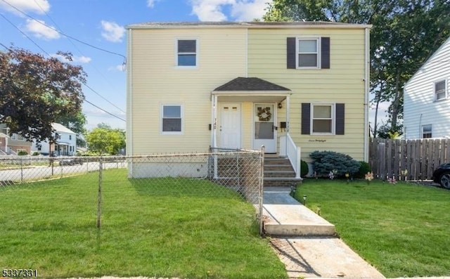 view of front of home with a front yard