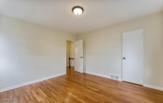 empty room with light wood-type flooring