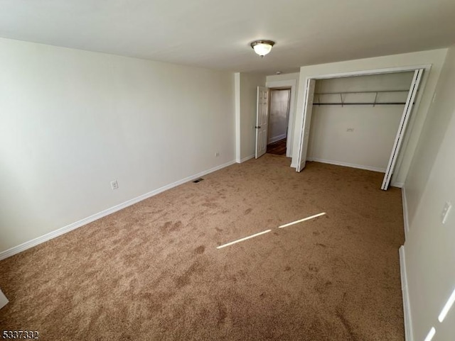 unfurnished bedroom with carpet