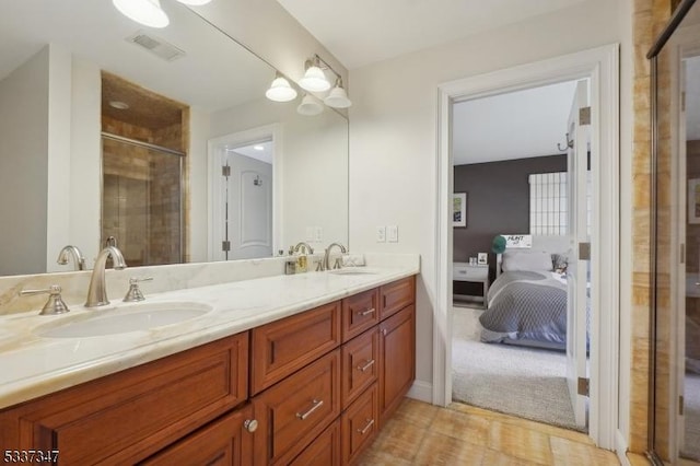 full bathroom featuring visible vents, a sink, ensuite bath, and double vanity