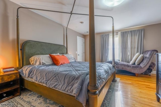 bedroom featuring wood finished floors