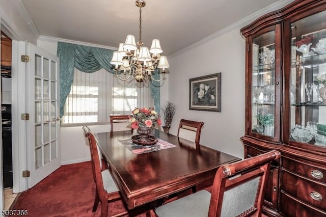 carpeted dining space with a chandelier and crown molding